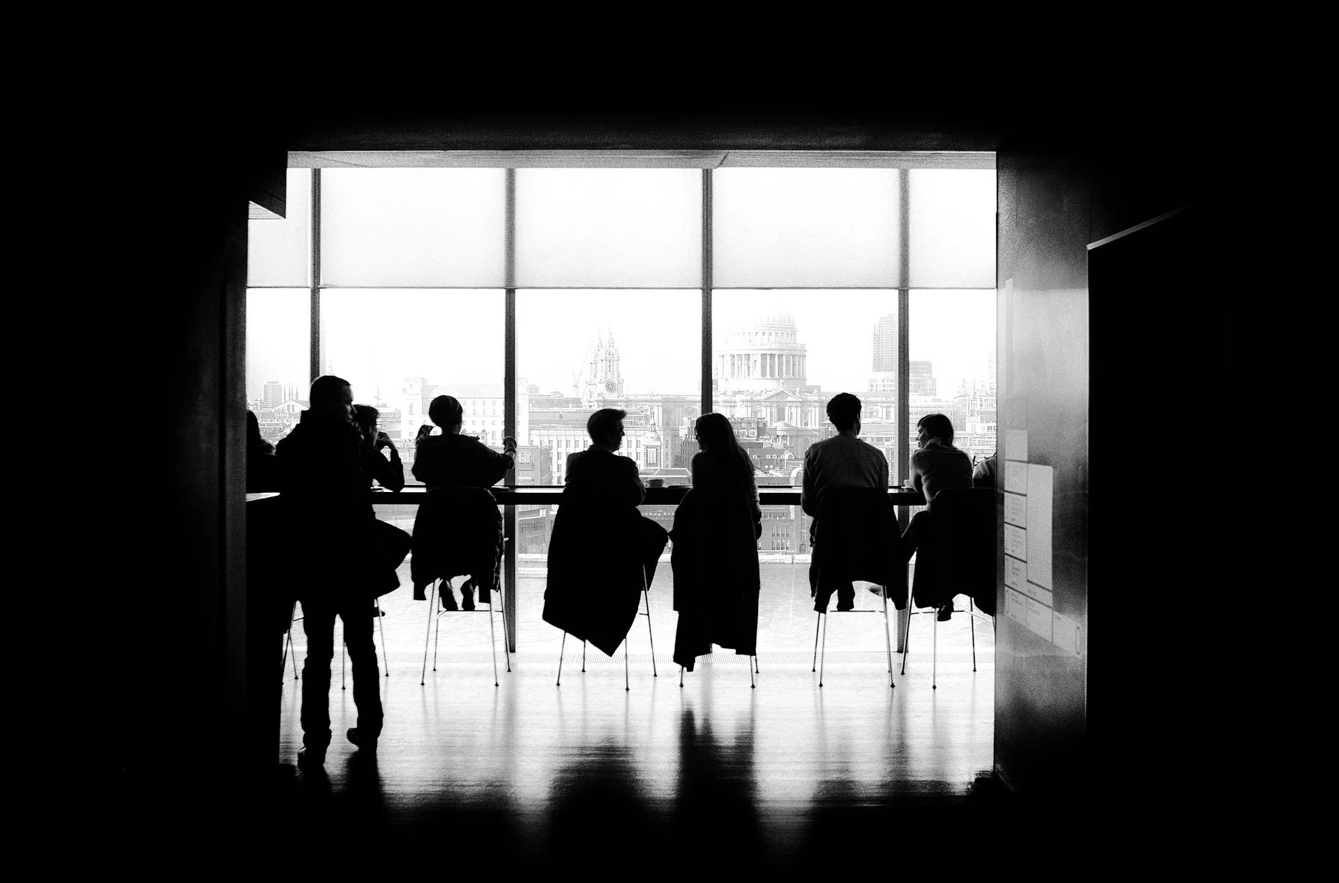 Silhouette of business team having lunch